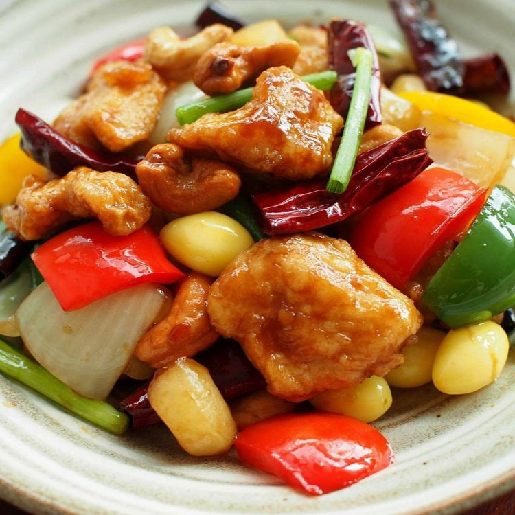 Cashew Nut Chicken – Stir-fried chicken with cashews, vegetables, and light sauce